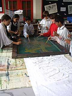 Pupils painting on screen