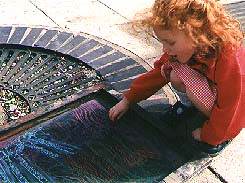 pupil drawing directly onto screen with wax crayons