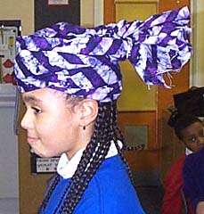 Sandhurst pupils modelling clothes from the handling collection