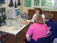 partner pupils looking at website off-line