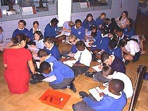 Christ Church pupils writing at the Horniman Museum