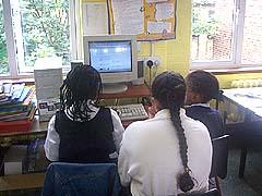 Pupils completing form