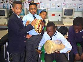 pupils looking at the handling collection