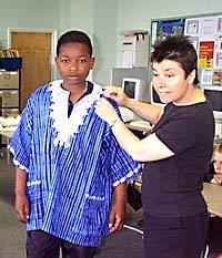 pupils wearing clothes from the handling collection
