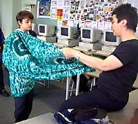 pupils wearing clothes from the handling collection