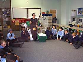 pupils looking at the handling collection
