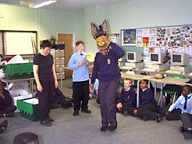 pupils looking at the handling collection